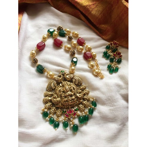 Kundan Jadau Lakshmi Double Peacock Pendant Set - Red with Green.