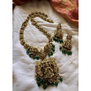 Royal Gold alike Antique Lakshmi Intricate with Narashimma Flower Long Neckpiece - Green Beads