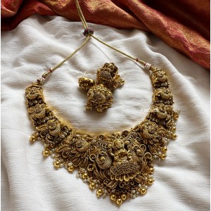AD Lakshmi with Beautiful Peacock Neckpiece - Gold Beads.