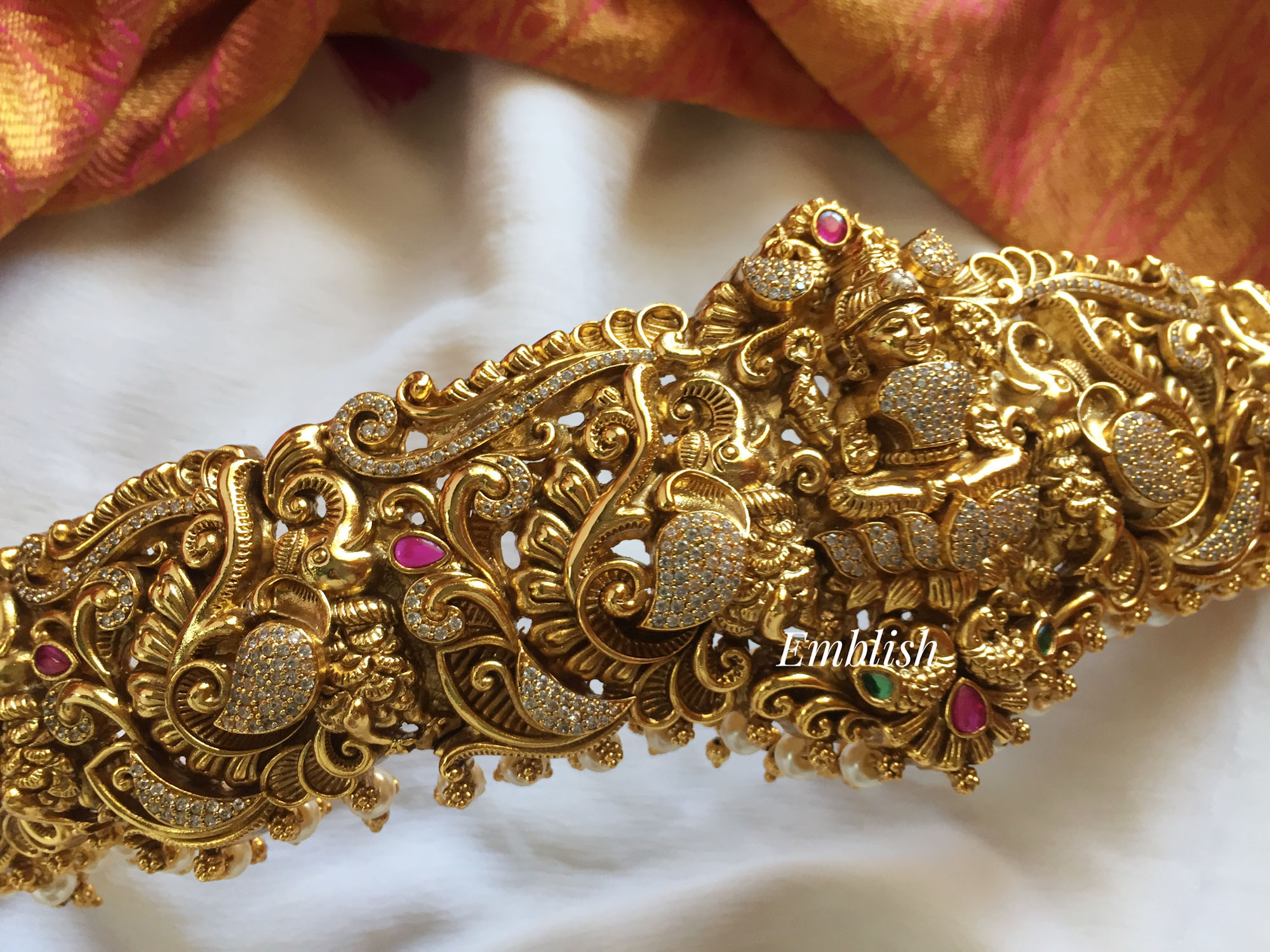Gold alike Antique Ad Lakshmi with Double Haathi Peacock Hipbelt.